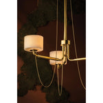 Playing with the concept of jewelry as installation, Bunda mixes structure and fluidity to create eye-catching drama. Finished in Vintage Brass, delicate rope chains dangle and loop across the streamlined arms of this 3- or 9-light chandelier. Amethyst Home provides interior design, new home construction design consulting, vintage area rugs, and lighting in the Salt Lake City metro area.