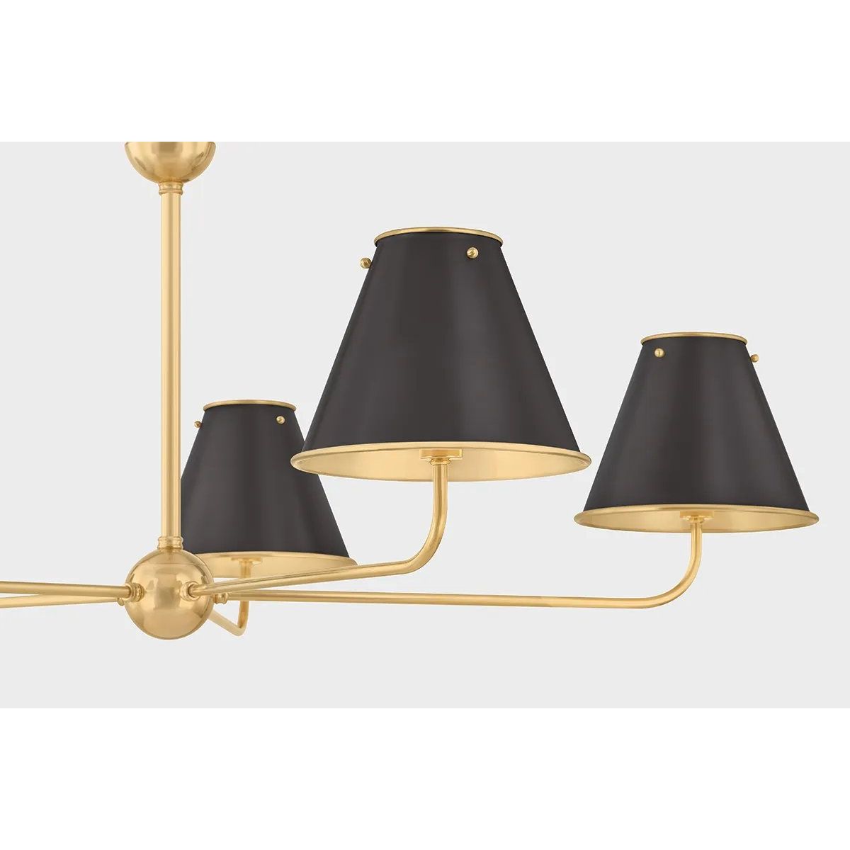 The Burghley family channels a tailored aesthetic with clean lines and sleek metal shades. Featuring Mark D. Sikes’ signature brass ball detail as well as stylish bolts securing the shades, Burghley makes heritage-inspired silhouettes feel fresh. Amethyst Home provides interior design, new home construction design consulting, vintage area rugs, and lighting in the Washington metro area.
