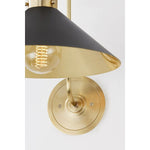 This classic metal shade design feels special with fresh finish combinations and sleek, heritage-inspired details. The contrastiing Aged Brass accents and modern gooseneck arm allow the pendants and sconce an updated, yet classic feel. The tapered shade over a five-light candelabra give the chandelier new traditional appeal. Amethyst Home provides interior design, new home construction design consulting, vintage area rugs, and lighting in the Charlotte metro area.