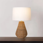 Inspired by vintage handwoven baskets, Eastbridge is defined by warm textural contrasts and tonal variations. Handwoven from natural abaca, the voluminous base is embellished with a simple striped pattern. Amethyst Home provides interior design, new home construction design consulting, vintage area rugs, and lighting in the Miami metro area.