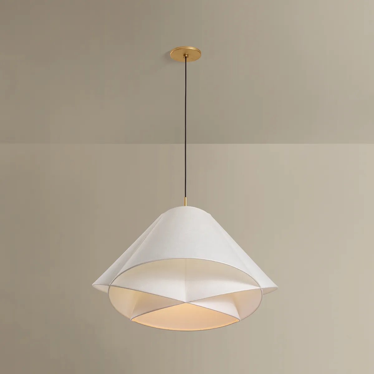 The dynamically layered design of the Edna pendant seeks to push the boundaries of what is possible with a handmade paper shade construction. Constructed as one piece, the shade is comprised of three identical pieces that intersect one another in a perfect geometric array. Amethyst Home provides interior design, new home construction design consulting, vintage area rugs, and lighting in the Calabasas metro area.