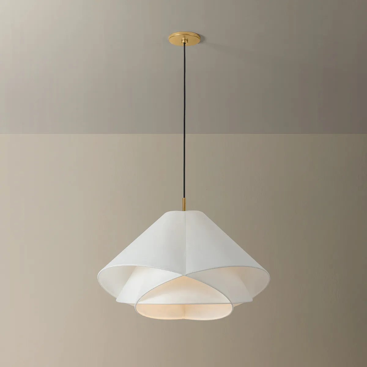The dynamically layered design of the Edna pendant seeks to push the boundaries of what is possible with a handmade paper shade construction. Constructed as one piece, the shade is comprised of three identical pieces that intersect one another in a perfect geometric array. Amethyst Home provides interior design, new home construction design consulting, vintage area rugs, and lighting in the Seattle metro area.