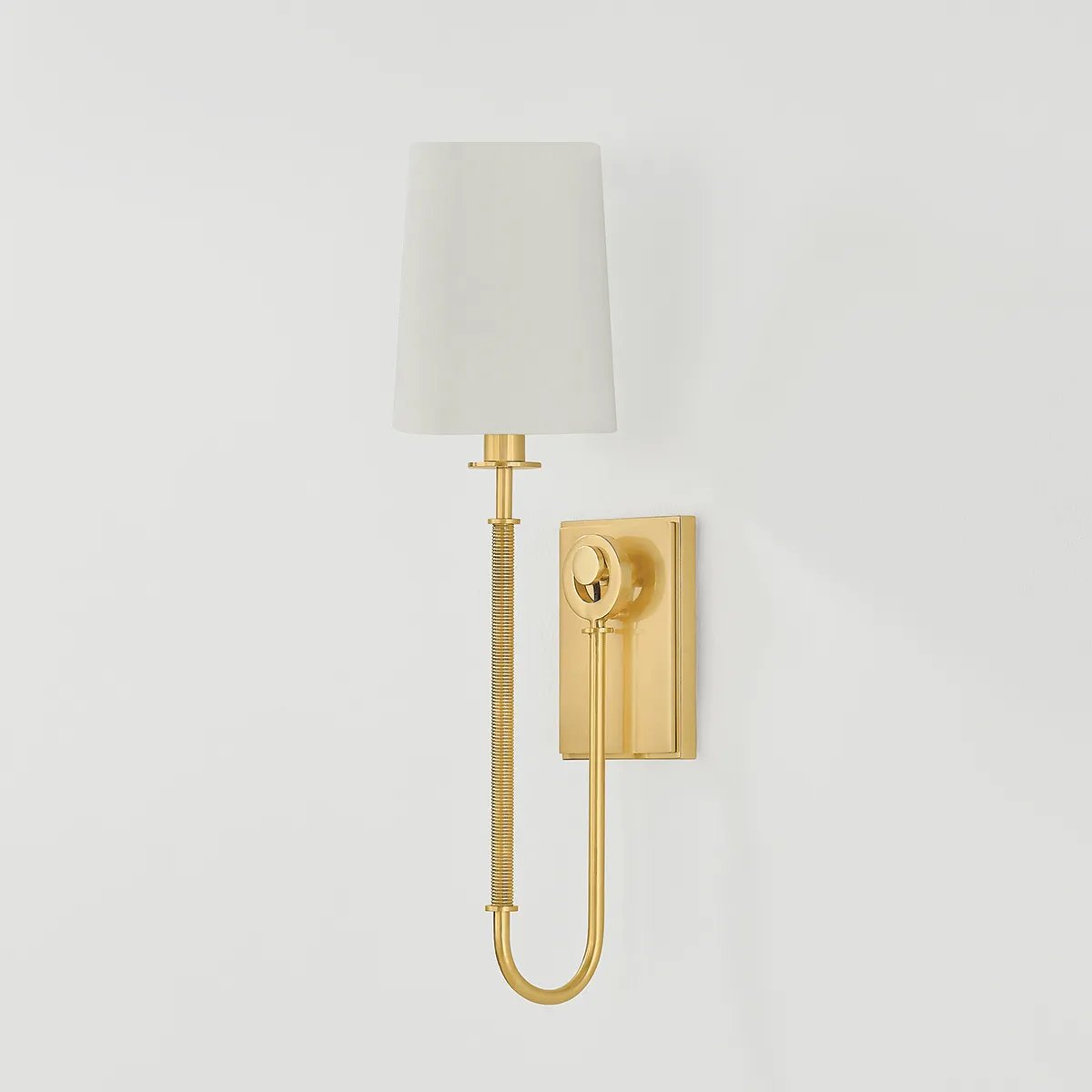The antique-inspired silhouette of the Glenmont sconce is slender and refined with machine-led hardware. Each stem features a horizontal knurl resembling a screw, adding texture and a contemporary feel to the fixture. Amethyst Home provides interior design, new home construction design consulting, vintage area rugs, and lighting in the Scottsdale metro area.
