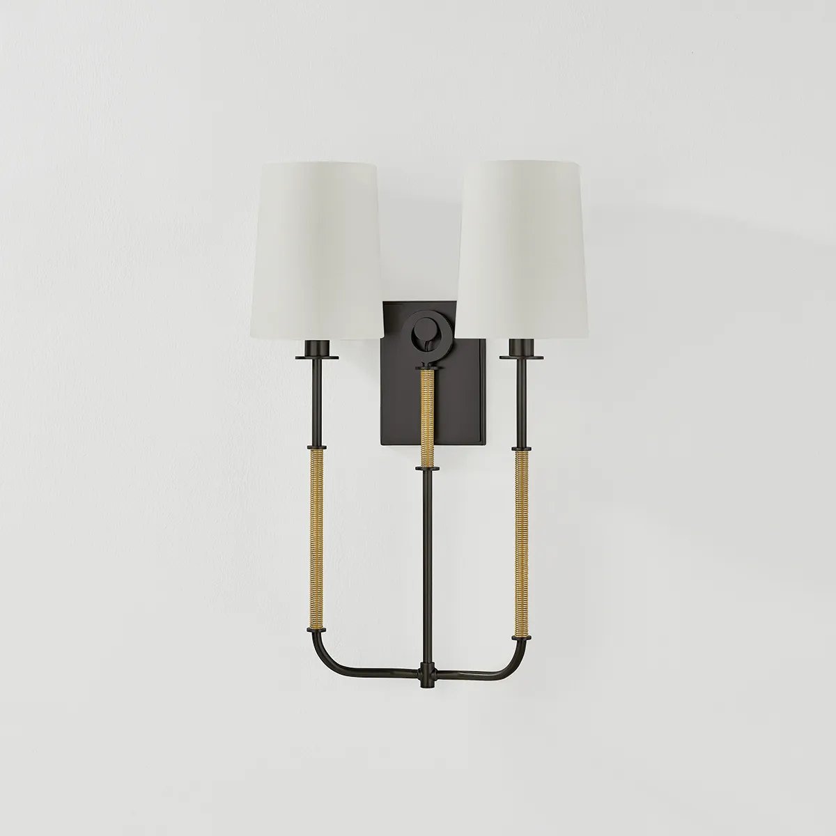 The antique-inspired silhouette of the Glenmont sconce is slender and refined with machine-led hardware. Each stem features a horizontal knurl resembling a screw, adding texture and a contemporary feel to the fixture. Amethyst Home provides interior design, new home construction design consulting, vintage area rugs, and lighting in the Monterey metro area.