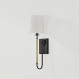 The antique-inspired silhouette of the Glenmont sconce is slender and refined with machine-led hardware. Each stem features a horizontal knurl resembling a screw, adding texture and a contemporary feel to the fixture. Amethyst Home provides interior design, new home construction design consulting, vintage area rugs, and lighting in the Seattle metro area.