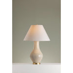 Artisanal and contemporary, Hanslope features a gracefully sculpted ceramic base paired with a crisp white linen shade. The unique form and proportions, coupled with the off-white French Muslin glaze give this lamp an earthy, organic feel. The glossy finish adds to the charm of this lovely everyday light fixture Amethyst Home provides interior design, new home construction design consulting, vintage area rugs, and lighting in the Charlotte metro area.