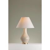 Artisanal and contemporary, Hanslope features a gracefully sculpted ceramic base paired with a crisp white linen shade. The unique form and proportions, coupled with the off-white French Muslin glaze give this lamp an earthy, organic feel. The glossy finish adds to the charm of this lovely everyday light fixture Amethyst Home provides interior design, new home construction design consulting, vintage area rugs, and lighting in the Charlotte metro area.