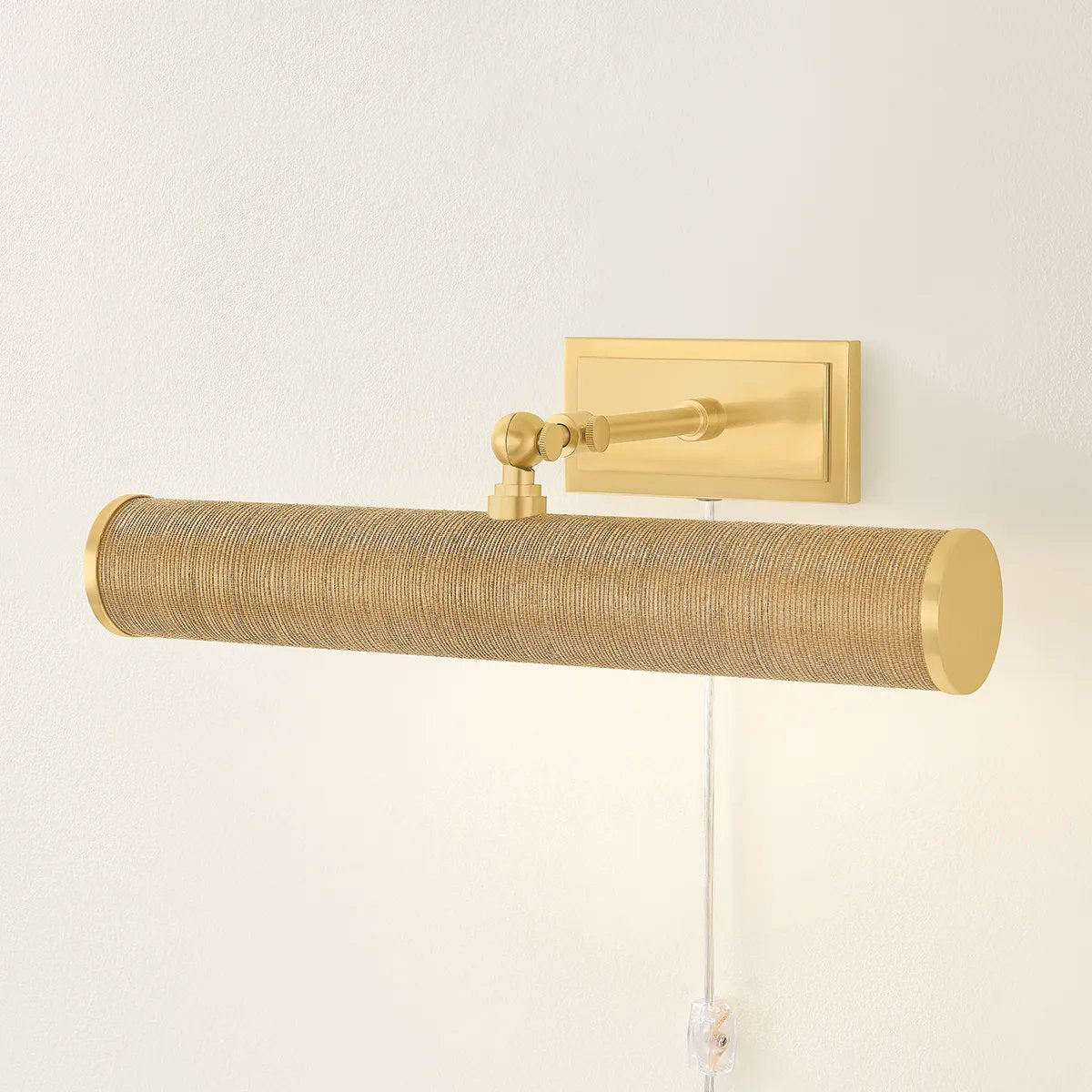 Whether you want to bring more attention to artwork or highlight a wall shelf of your favorite things, Holly is up to the task. This plug-in picture light now comes in an Aged Brass or Natural Grasscloth finish to create a more traditional or distinctive look. Amethyst Home provides interior design, new home construction design consulting, vintage area rugs, and lighting in the Calabasas metro area.
