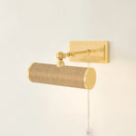 Whether you want to bring more attention to artwork or highlight a wall shelf of your favorite things, Holly is up to the task. This plug-in picture light now comes in an Aged Brass or Natural Grasscloth finish to create a more traditional or distinctive look. Amethyst Home provides interior design, new home construction design consulting, vintage area rugs, and lighting in the Salt Lake City metro area.