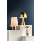 The contrast between the oblong domed shade and the conical base of Hopkinton creates a striking geometric design. Whether this petite lamp is finished in Aged Brass or Distressed Bronze, the on-trend mushroom silhouette adds a dose of personality. Its integrated rechargeable LED light source ensures lasting functionality.  Amethyst Home provides interior design, new home construction design consulting, vintage area rugs, and lighting in the Alpharetta metro area.