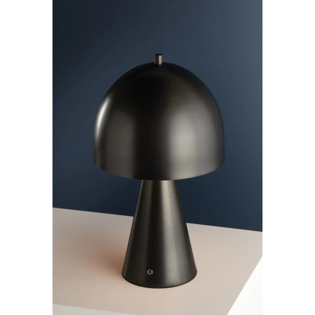 The contrast between the oblong domed shade and the conical base of Hopkinton creates a striking geometric design. Whether this petite lamp is finished in Aged Brass or Distressed Bronze, the on-trend mushroom silhouette adds a dose of personality. Its integrated rechargeable LED light source ensures lasting functionality.  Amethyst Home provides interior design, new home construction design consulting, vintage area rugs, and lighting in the Calabasas metro area.