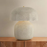 The Leetown lamp reimagines an iconic mushroom silhouette with playful proportions and a highly textured finish. Putting a modern spin on a traditional crackle glaze, ink is applied between the fractured plates to create a striking, graphic effect. Amethyst Home provides interior design, new home construction design consulting, vintage area rugs, and lighting in the Calabasas metro area.