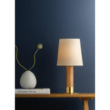 The Meadowbrook rechargeable lamp reinterprets a traditional silhouette with charming details. A beautifully grained light oak base rests upon a scalloped Aged Brass foot, introducing a graphic floral element. Topped with a classic white linen shade, the design balances decorative appeal with modern tailoring. Amethyst Home provides interior design, new home construction design consulting, vintage area rugs, and lighting in the Miami metro area.