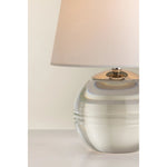 Ridged with ripple-like cuts, the crystal base of the Nicole table lamp makes for an eye-catching accent piece. Topped with a beautiful white linen shade, this pretty portable is rechargeable, adding convenience when styling. With classic Aged Brass-finished hardware, it’s the perfect addition to any bookshelf or small space. Amethyst Home provides interior design, new home construction design consulting, vintage area rugs, and lighting in the Dallas metro area.