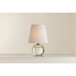 Ridged with ripple-like cuts, the crystal base of the Nicole table lamp makes for an eye-catching accent piece. Topped with a beautiful white linen shade, this pretty portable is rechargeable, adding convenience when styling. With classic Aged Brass-finished hardware, it’s the perfect addition to any bookshelf or small space. Amethyst Home provides interior design, new home construction design consulting, vintage area rugs, and lighting in the Portland metro area.