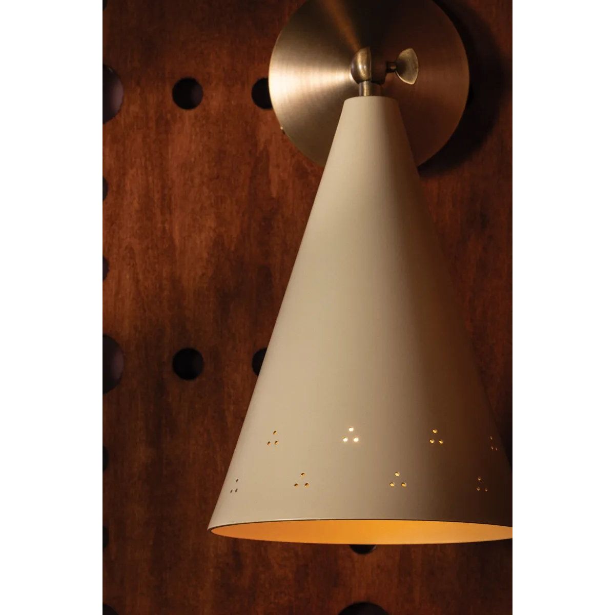 Drawing inspiration from the relaxed style of coastal villages, the Pawley family is carefree yet intentional. The pendant features graceful metalwork with a Historic Bronze finish, including a charming loop below the Soft Sand shade. With an adjustable swivel head, the sconce lets you direct light exactly where needed. Amethyst Home provides interior design, new home construction design consulting, vintage area rugs, and lighting in the Winter Garden metro area.