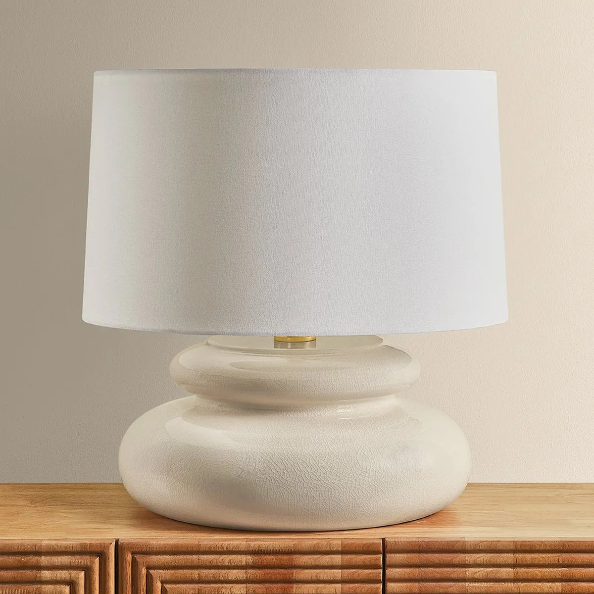 An exploration of voluminous forms and soft, endearing colors, the Pia family leans into the playful side of lighting. Stout proportions, generous curves, and stacked ceramic disc shapes lend an artisanal feel that is enhanced by the Butter Crackle and Chateau Crackle finishes. Amethyst Home provides interior design, new home construction design consulting, vintage area rugs, and lighting in the Park City metro area.