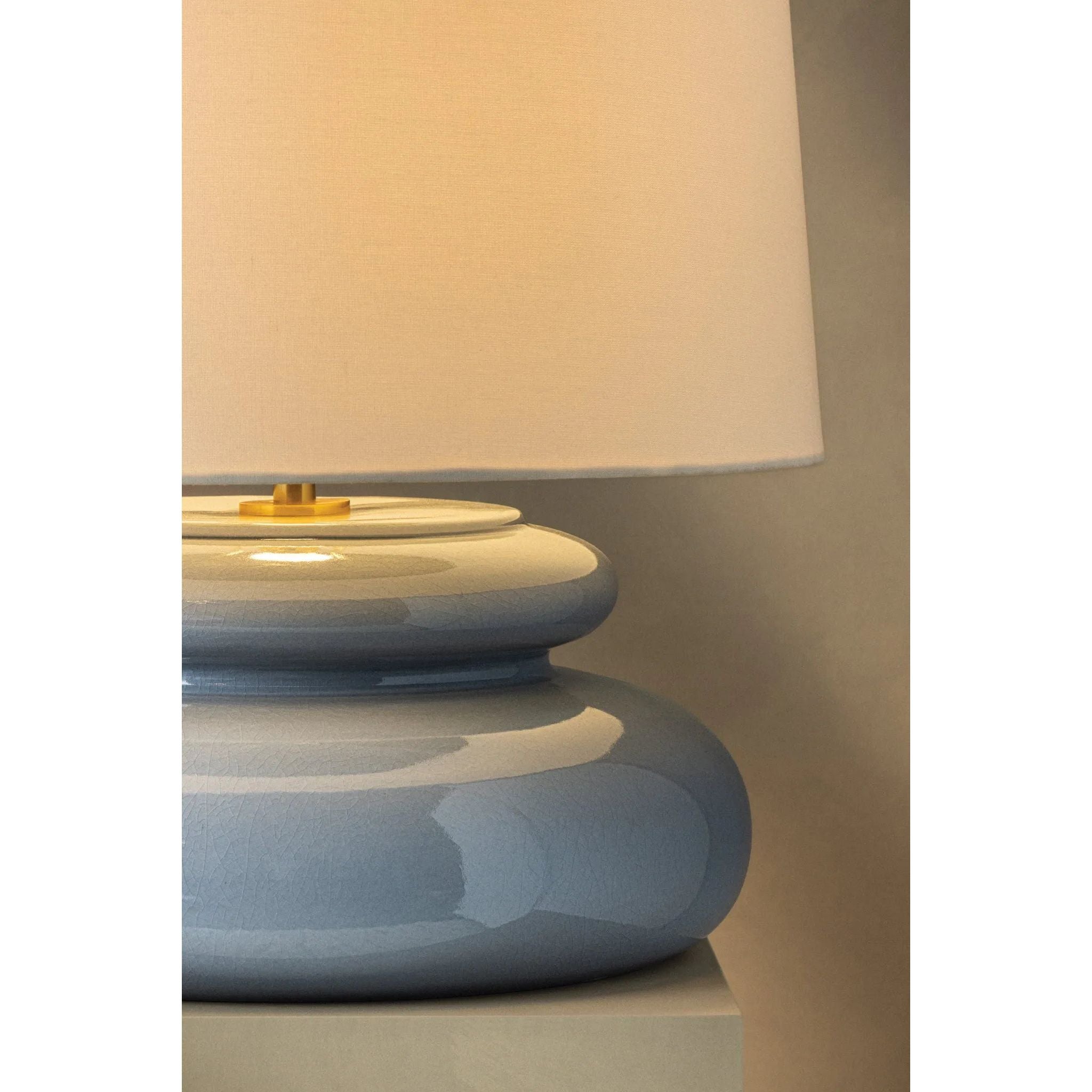 An exploration of voluminous forms and soft, endearing colors, the Pia family leans into the playful side of lighting. Stout proportions, generous curves, and stacked ceramic disc shapes lend an artisanal feel that is enhanced by the Butter Crackle and Chateau Crackle finishes. Amethyst Home provides interior design, new home construction design consulting, vintage area rugs, and lighting in the Salt Lake City metro area.