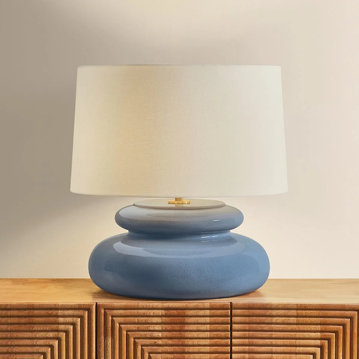An exploration of voluminous forms and soft, endearing colors, the Pia family leans into the playful side of lighting. Stout proportions, generous curves, and stacked ceramic disc shapes lend an artisanal feel that is enhanced by the Butter Crackle and Chateau Crackle finishes. Amethyst Home provides interior design, new home construction design consulting, vintage area rugs, and lighting in the Scottsdale metro area.