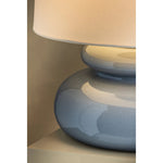 An exploration of voluminous forms and soft, endearing colors, the Pia family leans into the playful side of lighting. Stout proportions, generous curves, and stacked ceramic disc shapes lend an artisanal feel that is enhanced by the Butter Crackle and Chateau Crackle finishes. Amethyst Home provides interior design, new home construction design consulting, vintage area rugs, and lighting in the Winter Garden metro area.