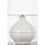 Inspired by rustic pottery, this table lamp's beautifully shaped base is crafted of pale sage ceramic giving it an earthy pale green tone. The off white linen shade pairs naturally and casts a soft glow. Raised seamlines and a reactive glaze that allows hints of the natural ceramic to peek through, give the fixture a hand-thrown, crafted feel. Amethyst Home provides interior design, new home construction design consulting, vintage area rugs, and lighting in the Newport Beach metro area.
