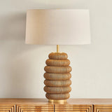 The lively Winbrook table lamp calls to mind the shape of a honeycomb. The voluminous base has been wrapped in natural pencil rattan, blending shape and material for a spin on the earthy, pillowy decor trend. Amethyst Home provides interior design, new home construction design consulting, vintage area rugs, and lighting in the Miami metro area.