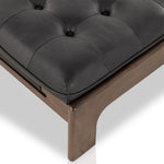 A Seventies-era style inspired by a flea market find. Top-grain leather features dramatic tufting with sling detailing and wide ash framing below. Sourced from one of the oldest family-owned tanneries in Italy's Bassano del Grappa, heirloom leather is salvaged and processed from upcycled hides featuring an abundance of natural markings, scars and color variations. Amethyst Home provides interior design, new construction, custom furniture, and area rugs in the Portland metro area