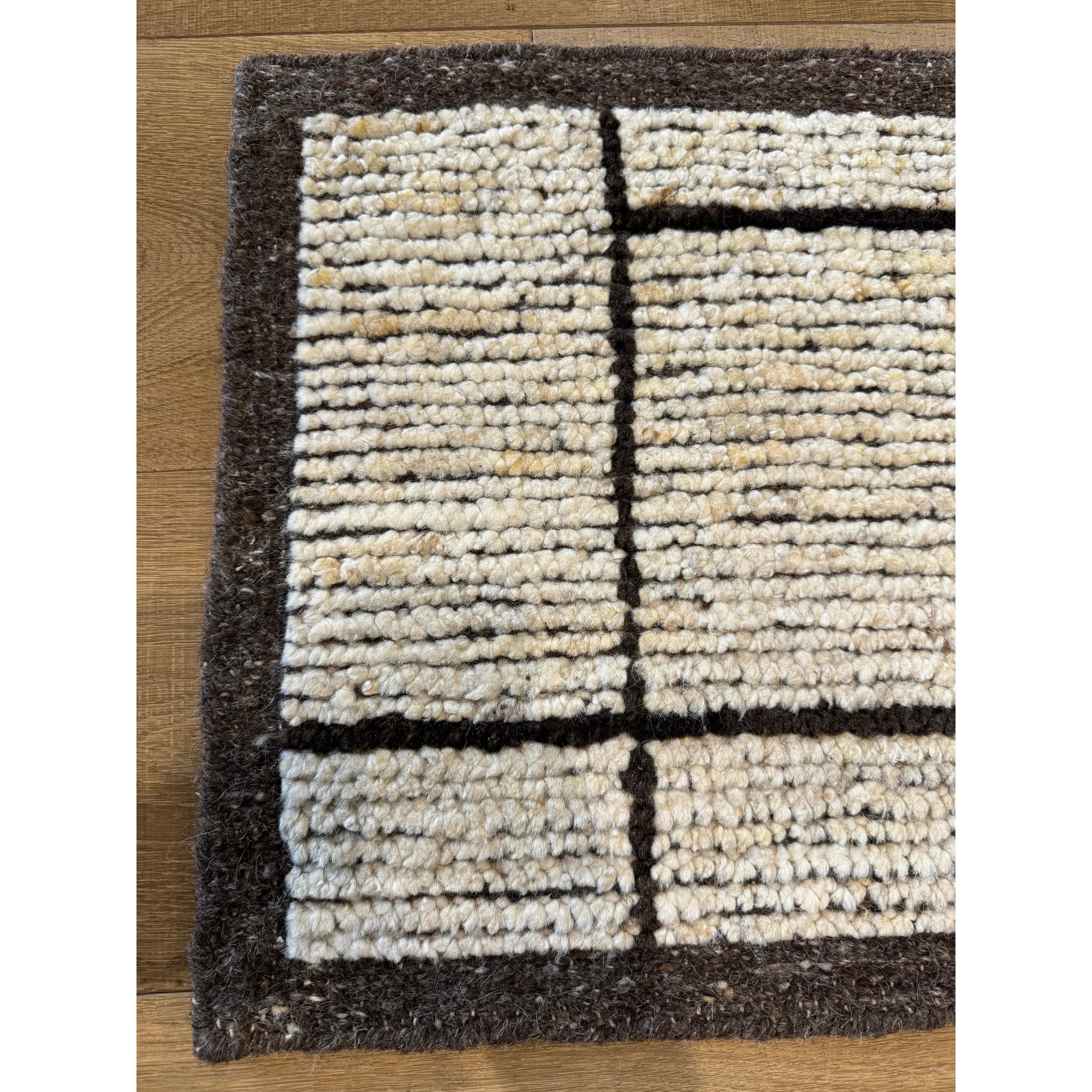 Subtle linear textures and natural colorways define the irresistible quality of the Seora collection. The Dorian area rug features a series of parallel and perpendicular lines for an intriguing dose of modern appeal. Amethyst Home provides interior design services, furniture, rugs, and lighting in the Kansas City metro area.