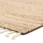 Drawing inspiration from Moroccan textiles, Alpine showcases the beauty in simplicity. Durable wool is hand-knotted onto a cotton foundation to create this high-piled accent piece. Its warm, solid tan design is finished with braided fringe trims for a touch of boho charm. Amethyst Home provides interior design, new home construction design consulting, vintage area rugs, and lighting in the Calabasas metro area.