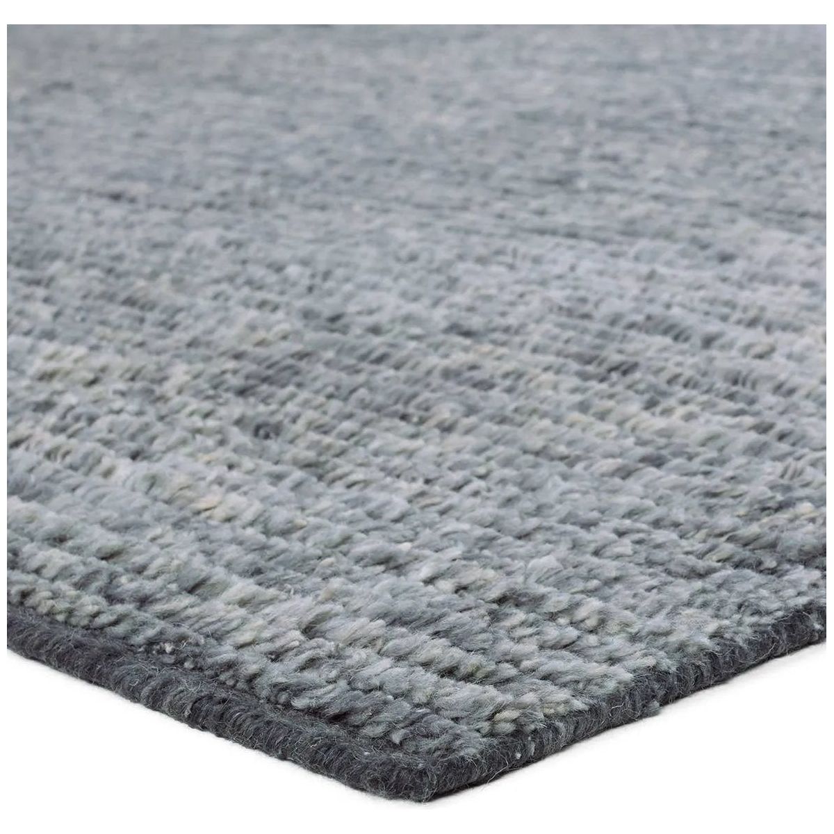 Drawing inspiration from Moroccan textiles, Alpine showcases the beauty in simplicity. Durable wool is hand-knotted onto a cotton foundation to create this high-piled accent piece. Its solid gray design instantly adds warmth and comfort to any indoor, medium-traffic setting.Hand Knotte Amethyst Home provides interior design, new home construction design consulting, vintage area rugs, and lighting in the Des Moines metro area.