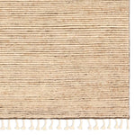 Drawing inspiration from Moroccan textiles, Alpine showcases the beauty in simplicity. Durable wool is hand-knotted onto a cotton foundation to create this high-piled accent piece. Its warm, solid tan design is finished with braided fringe trims for a touch of boho charm. Amethyst Home provides interior design, new home construction design consulting, vintage area rugs, and lighting in the Newport Beach metro area.