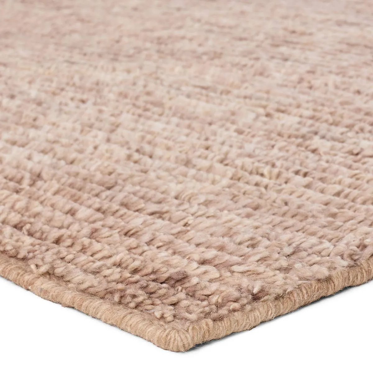 Drawing inspiration from Moroccan textiles, Alpine showcases the beauty in simplicity. Durable wool is hand-knotted onto a cotton foundation to create this high-piled accent piece. Its solid beige design instantly adds warmth and comfort to any indoor, medium-traffic setting.Hand Knotte Amethyst Home provides interior design, new home construction design consulting, vintage area rugs, and lighting in the Portland metro area.