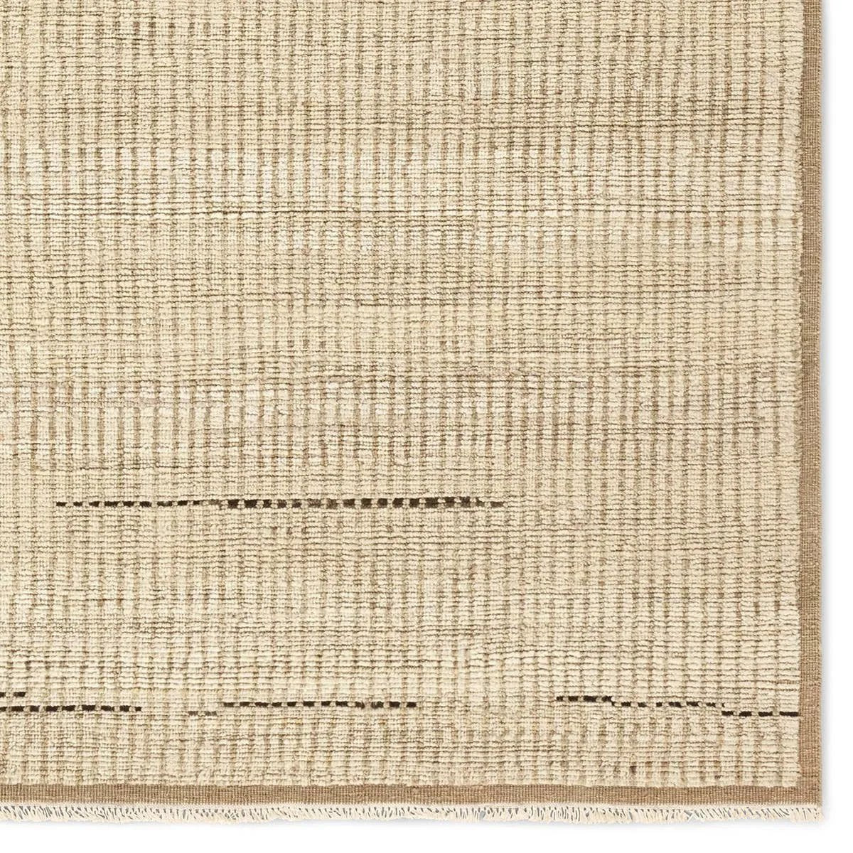 Full of texture, the handknotted Kazben Andar stuns with modern Moroccan patterns in natural hues. The Andar design delights with a taupe, tan, and brown linear pattern. A thin border adds the finishing touches to this elevated accent piece. Low, ribbed pile creates visual intrigue and grounds any contemporary space. Amethyst Home provides interior design, new home construction design consulting, vintage area rugs, and lighting in the Scottsdale metro area.