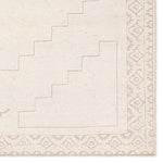 Hand carded wool, soft Tencel, and a neutral color palette define the handknotted Ashend Imbar. The Imbar rug showcases a Moroccan-inspired center medallion in a neutral, cream, taupe, and beige colorway. Geometric detailing via high and low pile establishes a thin border and provides a nod to the tribal styles of northern Africa. Amethyst Home provides interior design, new home construction design consulting, vintage area rugs, and lighting in the Washington metro area.