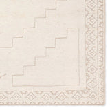 Hand carded wool, soft Tencel, and a neutral color palette define the handknotted Ashend Imbar. The Imbar rug showcases a Moroccan-inspired center medallion in a neutral, cream, taupe, and beige colorway. Geometric detailing via high and low pile establishes a thin border and provides a nod to the tribal styles of northern Africa. Amethyst Home provides interior design, new home construction design consulting, vintage area rugs, and lighting in the Washington metro area.