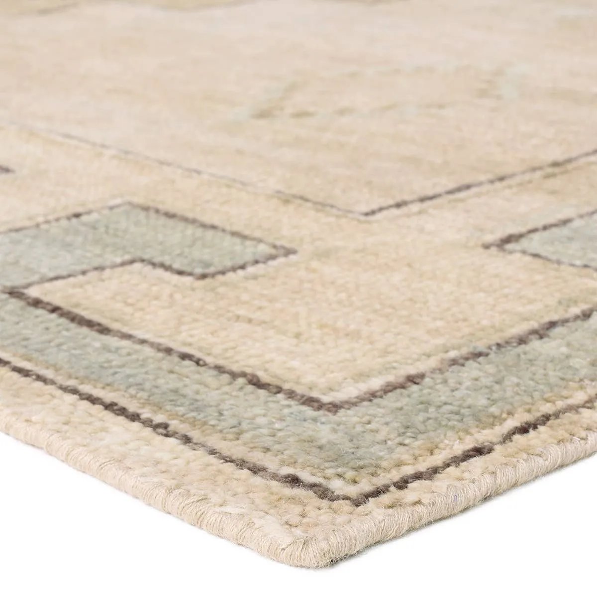 Classic in pattern, modern in palette—the Azzurro rug offers the best of both worlds. A light green medallion motif unfolds across a soft cream backdrop, balancing timeless elegance with contemporary sensibility. Amethyst Home provides interior design, new home construction design consulting, vintage area rugs, and lighting in the Des Moines metro area.