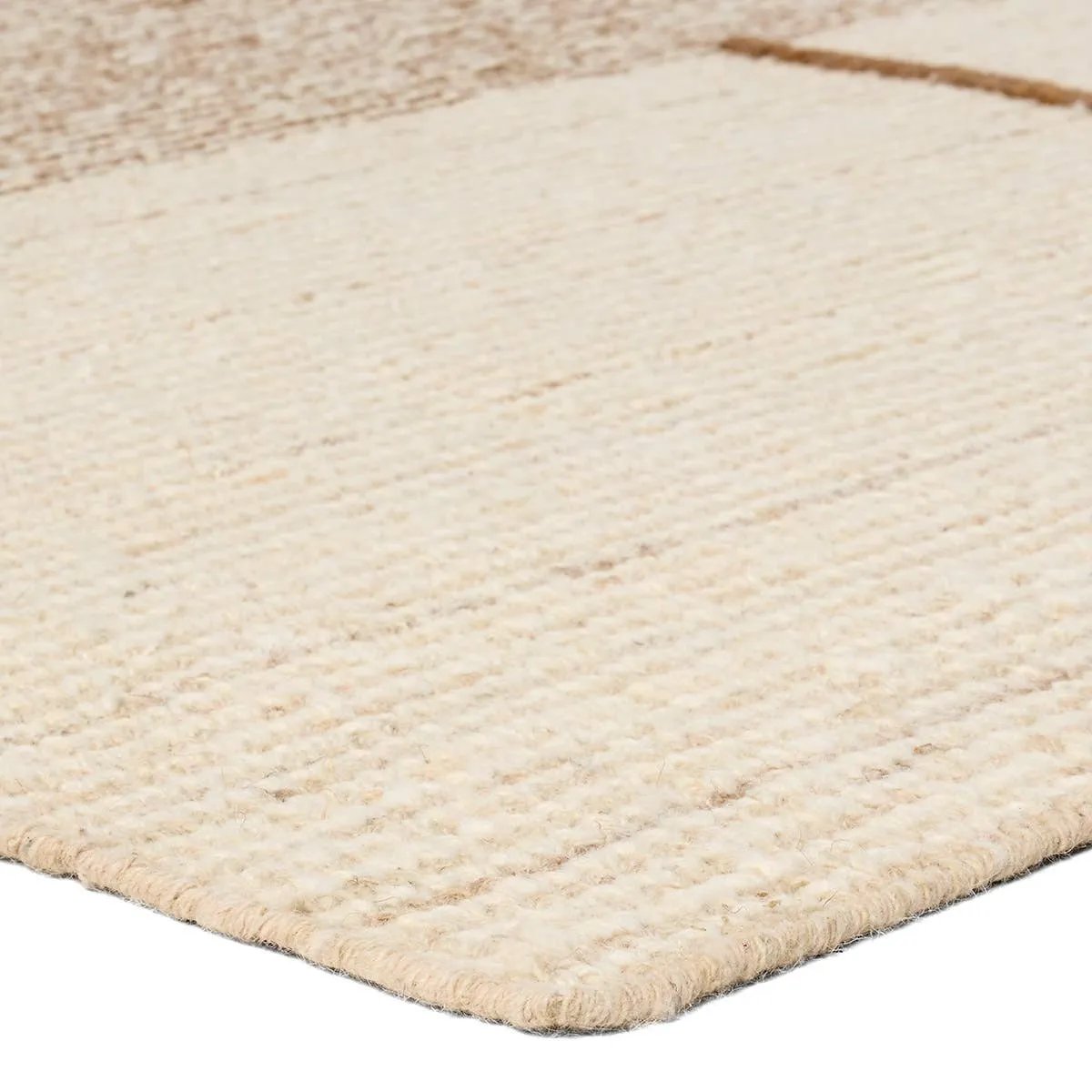 Earthy white and brown tones come together in a mesmerizing linear design, infusing the Bastien rug with contemporary elegance. Hand-knotted from a luxe wool pile, its luminous sheen highlights every intricate detail.Handwove Amethyst Home provides interior design, new home construction design consulting, vintage area rugs, and lighting in the Boston metro area.