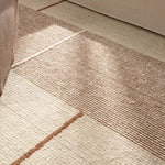Earthy white and brown tones come together in a mesmerizing linear design, infusing the Bastien rug with contemporary elegance. Hand-knotted from a luxe wool pile, its luminous sheen highlights every intricate detail.Handwove Amethyst Home provides interior design, new home construction design consulting, vintage area rugs, and lighting in the Calabasas metro area.