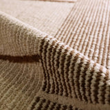 Earthy white and brown tones come together in a mesmerizing linear design, infusing the Bastien rug with contemporary elegance. Hand-knotted from a luxe wool pile, its luminous sheen highlights every intricate detail.Handwove Amethyst Home provides interior design, new home construction design consulting, vintage area rugs, and lighting in the Charlotte metro area.