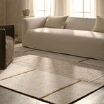 Earthy white and brown tones come together in a mesmerizing linear design, infusing the Bastien rug with contemporary elegance. Hand-knotted from a luxe wool pile, its luminous sheen highlights every intricate detail.Handwove Amethyst Home provides interior design, new home construction design consulting, vintage area rugs, and lighting in the Houston metro area.