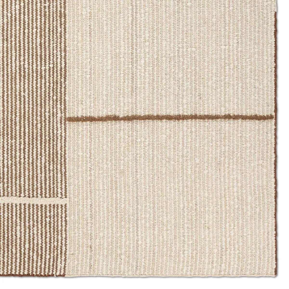 Earthy white and brown tones come together in a mesmerizing linear design, infusing the Bastien rug with contemporary elegance. Hand-knotted from a luxe wool pile, its luminous sheen highlights every intricate detail.Handwove Amethyst Home provides interior design, new home construction design consulting, vintage area rugs, and lighting in the Omaha metro area.