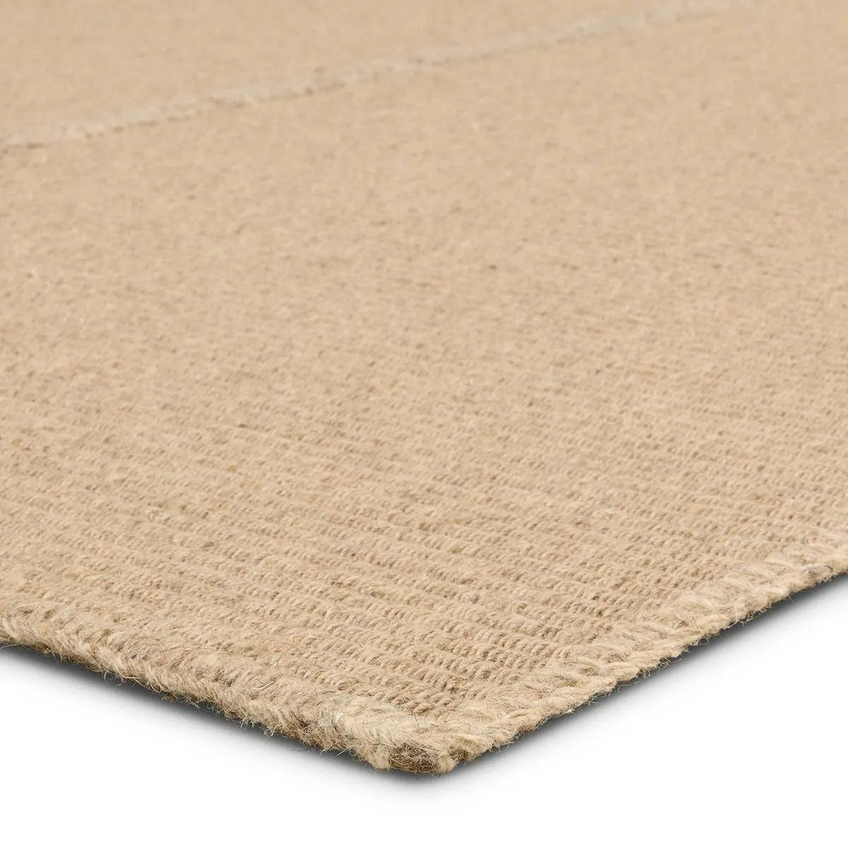 Authentic craftsmanship takes center stage with the Yatra Bayana. Handcrafted with meticulous care, this piece is sewn together in distinct channels, emulating the traditional techniques used by nomadic weavers with looms. Its solid tan shade and unique design elements create a contemporary aesthetic that blends seamlessly with modern interiors. Amethyst Home provides interior design, new home construction design consulting, vintage area rugs, and lighting in the Portland metro area.