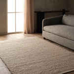 Cozy and stylish in the same moment, the hand-loomed Vestra Brodie boasts the soft and inviting texture of the shearling look with the addition of subtle, sophisticated details. With a neutral brown colorway, the Tadeo rug complements a room without detracting from its current design scheme.Handwove Amethyst Home provides interior design, new home construction design consulting, vintage area rugs, and lighting in the Charlotte metro area.