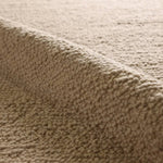 Cozy and stylish in the same moment, the hand-loomed Vestra Brodie boasts the soft and inviting texture of the shearling look with the addition of subtle, sophisticated details. With a neutral brown colorway, the Tadeo rug complements a room without detracting from its current design scheme.Handwove Amethyst Home provides interior design, new home construction design consulting, vintage area rugs, and lighting in the Newport Beach metro area.