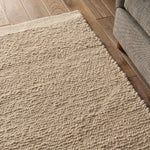 Cozy and stylish in the same moment, the hand-loomed Vestra Brodie boasts the soft and inviting texture of the shearling look with the addition of subtle, sophisticated details. With a neutral brown colorway, the Tadeo rug complements a room without detracting from its current design scheme.Handwove Amethyst Home provides interior design, new home construction design consulting, vintage area rugs, and lighting in the Tampa metro area.