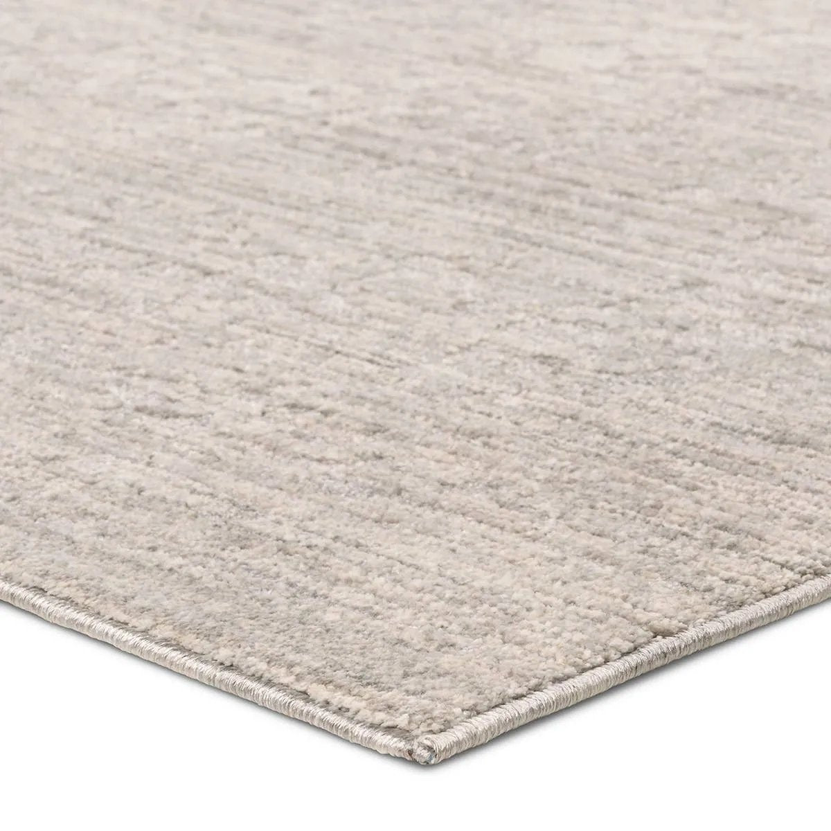 Timeless charm meets contemporary practicality. Crafted from space-dyed polyester, the Serenita Elam is tailored for indoor spaces that require both simplicity and durability. Its tonal palette of gray hues is carefully cross-woven for a natural, abrash effect.Power Loome Amethyst Home provides interior design, new home construction design consulting, vintage area rugs, and lighting in the Laguna Beach metro area.