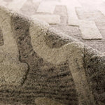 The handtufted Mallino Eminence designed by Nikki Chu infuses homes with contemporary appeal and stylishly contrasting motifs. Crafted from 100% undyed wool, the Eminence rug features a high-low texture with a soft hand and hand-embossed details. Amethyst Home provides interior design, new home construction design consulting, vintage area rugs, and lighting in the Nashville metro area.