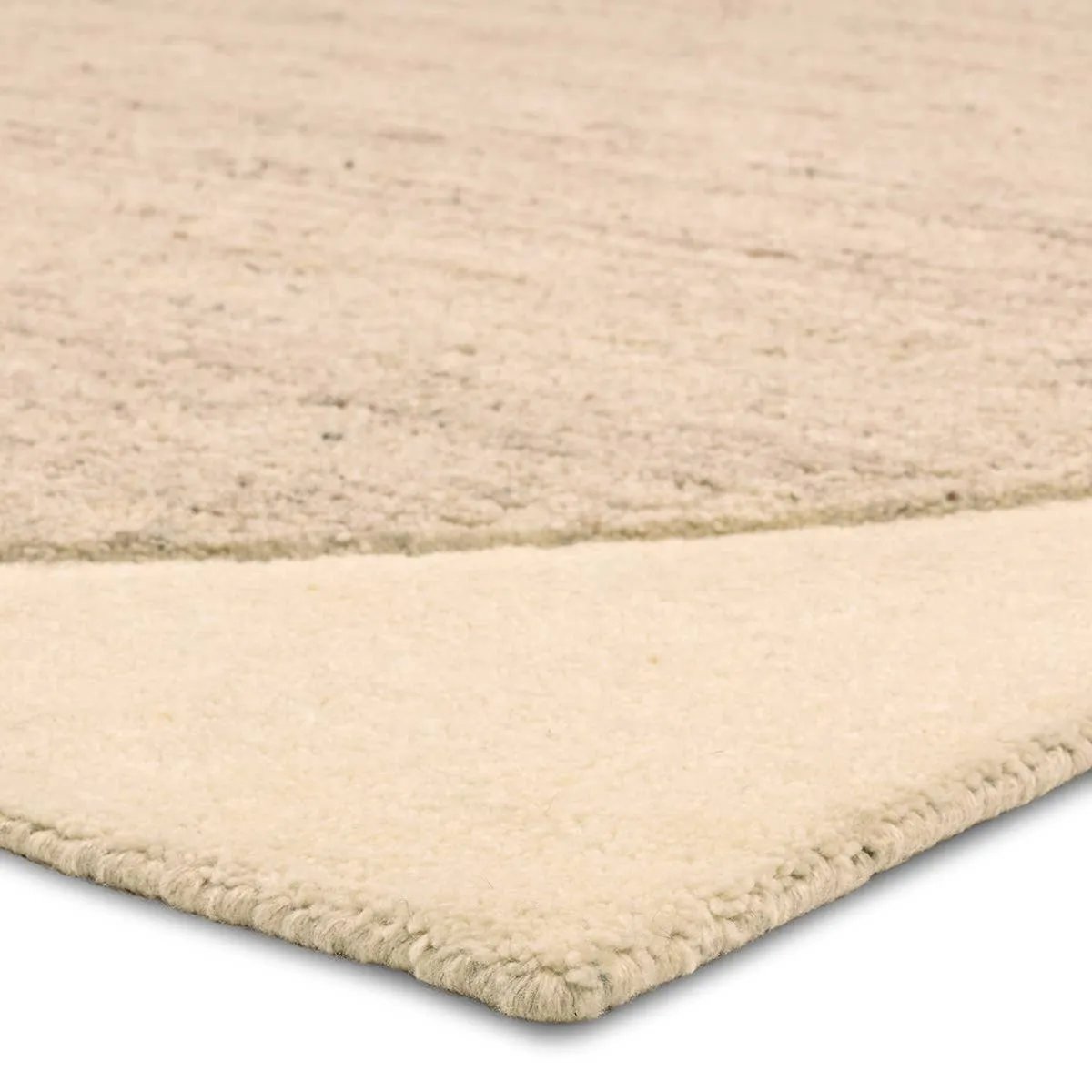 Add a contemporary flair to floors with the Reyner Haryana. Hand-tufted from 100% handspun, undyed wool, the plush rug features a high-low pile that accentuates its mid-century, Brutalist-inspired geometric pattern. Easy-to-match shades of tan and taupe to add warmth and depth to any interior.Hand Tufte Amethyst Home provides interior design, new home construction design consulting, vintage area rugs, and lighting in the Calabasas metro area.