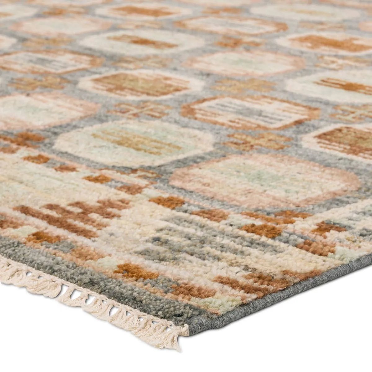 The Turkish-Killum-inspired Hazan Titale is intricately handknotted by artisans in India. Crafted with 15 knots per square inch, these durable area rugs thrive in both high and low traffic areas of the home. The Titale design showcases traditional-style miniature medallions in orange, slate, pink, light green, and cream hues. Amethyst Home provides interior design, new home construction design consulting, vintage area rugs, and lighting in the Winter Garden metro area.