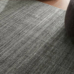 Subtle variations of gray create depth and dimension in the elegantly understated Hued rug. Handwoven with precision, its solid design offers a timeless foundation for any space—from modern to classic interiors.Handwove Amethyst Home provides interior design, new home construction design consulting, vintage area rugs, and lighting in the Alpharetta metro area.